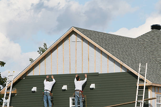 Professional Siding Contractor technician working in Fredericksburg, PA